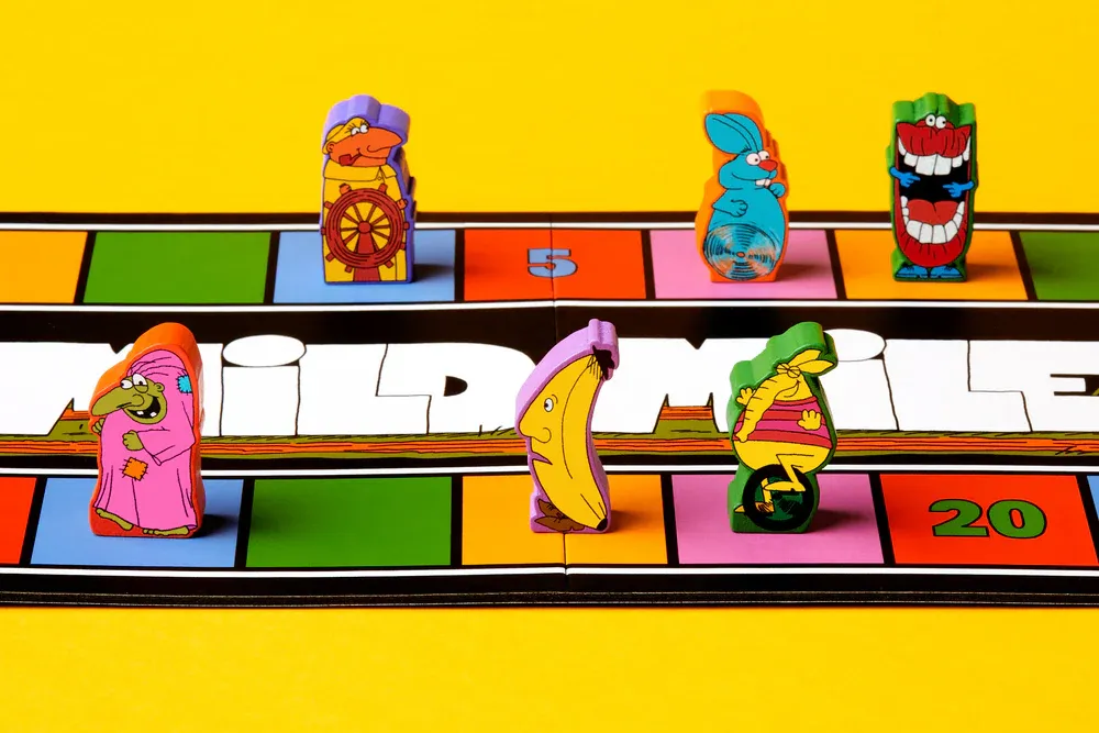 Magical Athlete spelplanen Mile Mile med startfält och färgglada karaktärer.